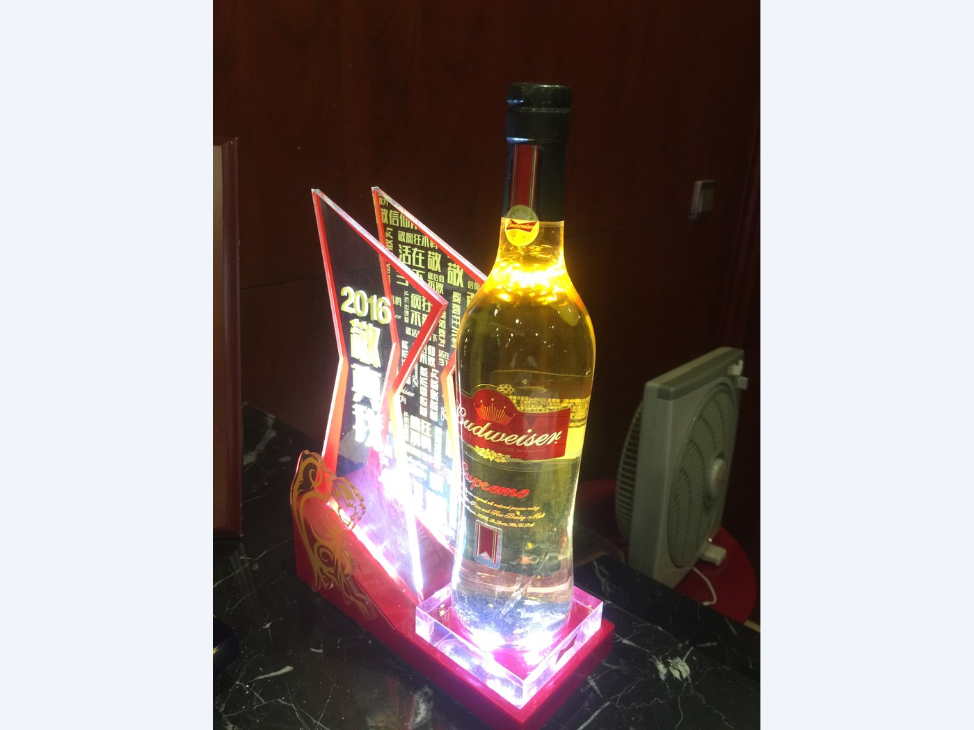Illuminated acrylic bottle display